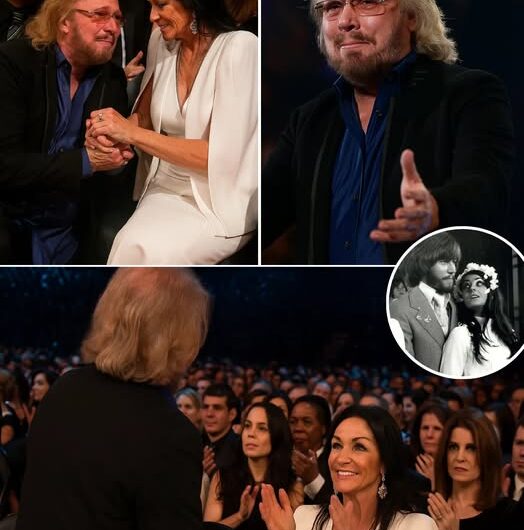 On a night meant for music, Barry Gibb gave the audience something even deeper—a love story. Setting down his guitar, he called his wife Linda to the stage. “She saved my life,” he whispered, his voice breaking. And then, hand in hand, they sang Words—not for fame, but for forever.