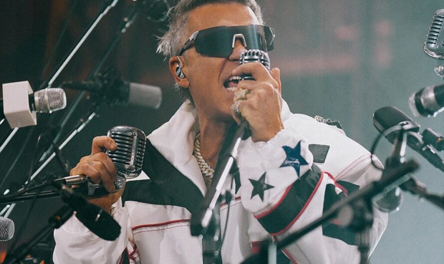 Robbie Williams confirms he delayed album to avoid Taylor Swift chart battle: “You can’t compete”